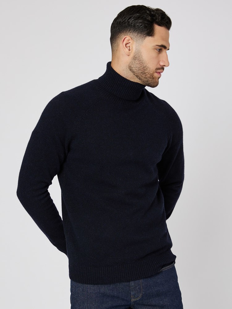 Sigurd polo strikkegenser 7505260_R15-MRCAPUCHIN-W23-Modell-Front_chn=boys_2116.jpg_Front||Front